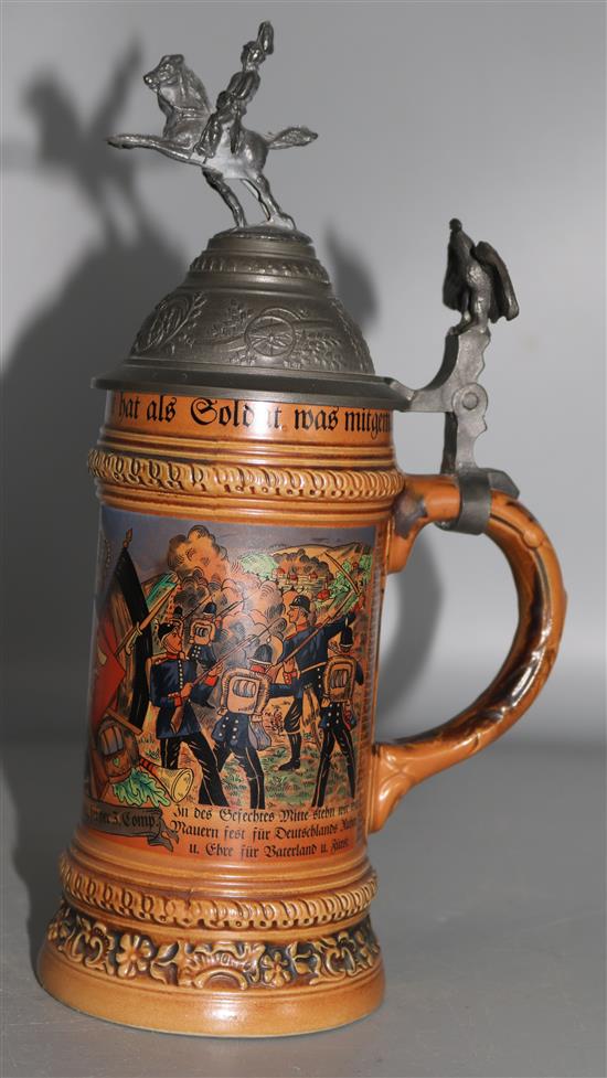 A beer stein decorated with a military scene